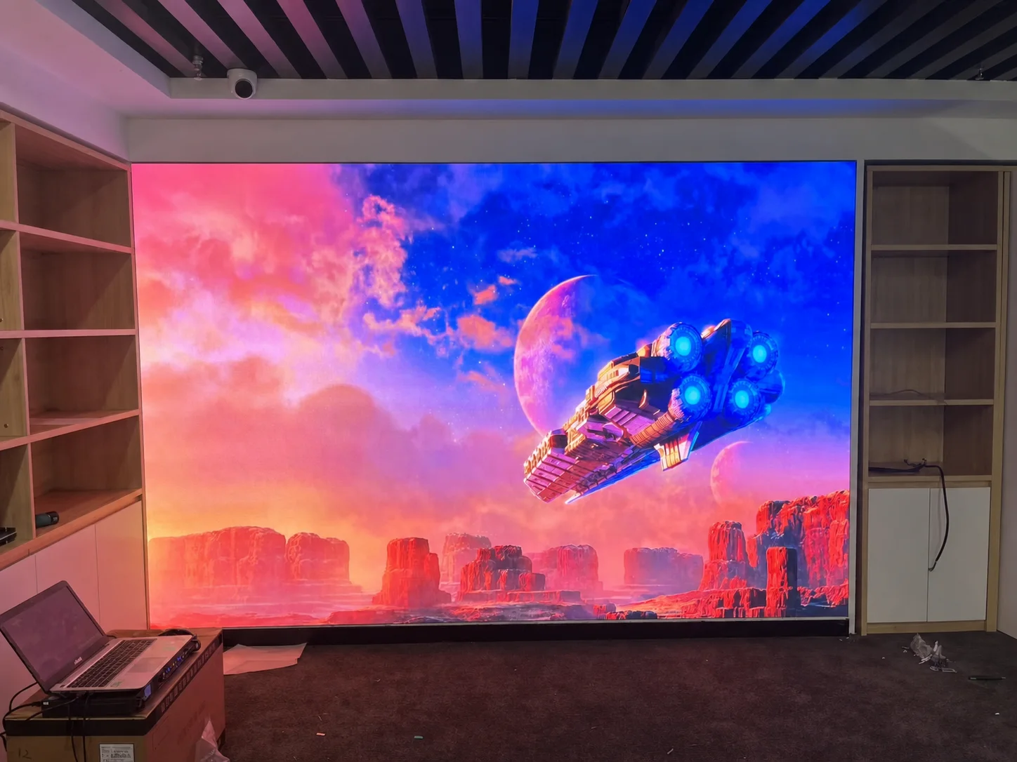 Front-service LED video wall installed in a corporate presentation room