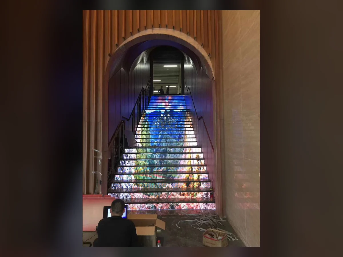 LED display installed on a narrower interior staircase