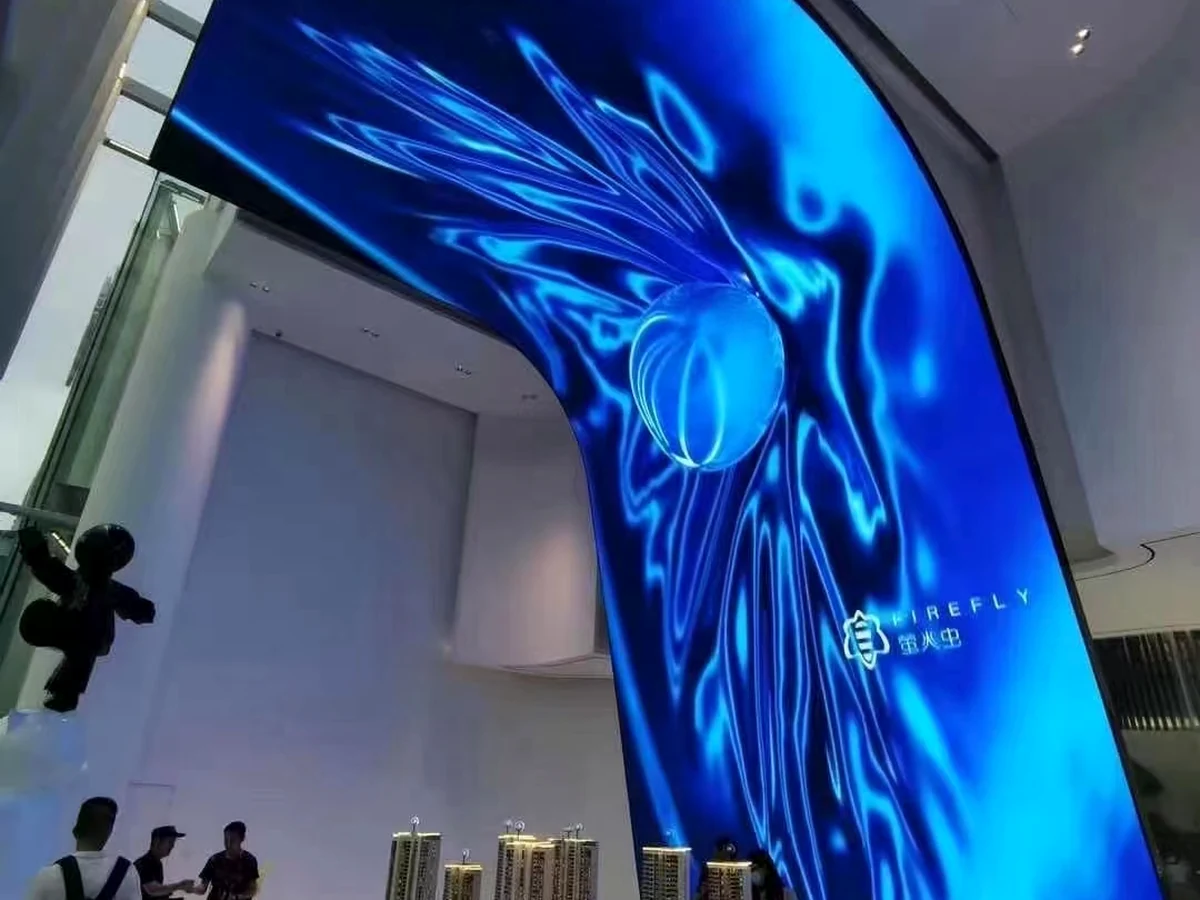 Curved architectural LED screen wrapping an interior wall