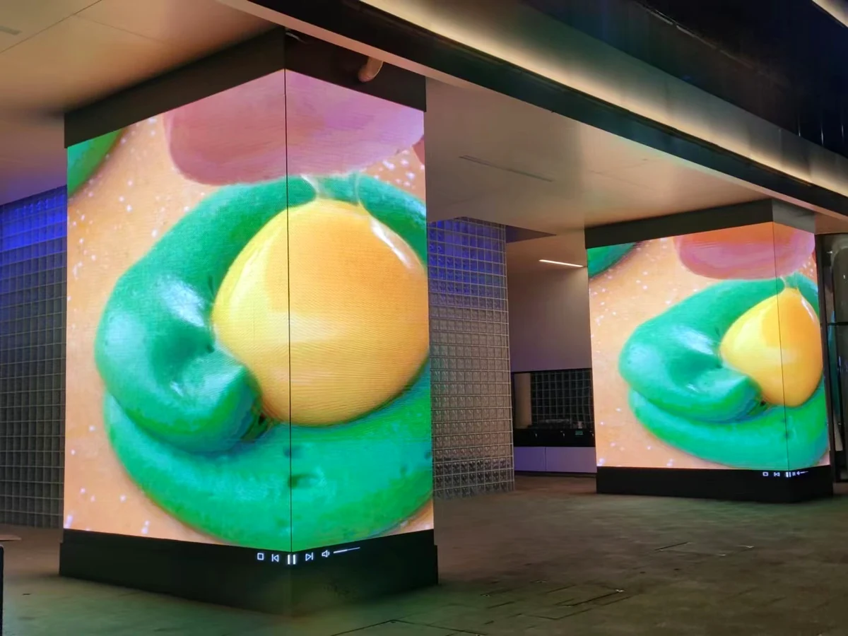 Custom corner LED display built around interior architecture