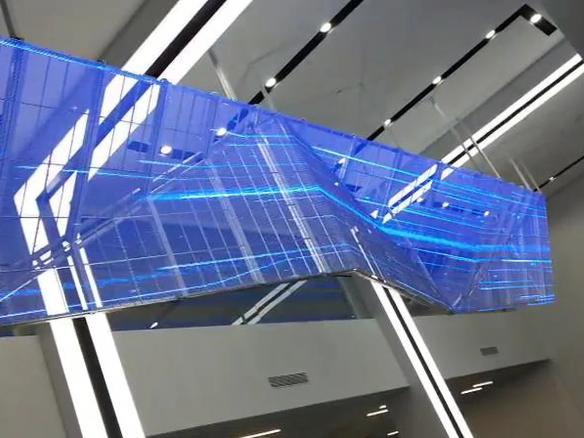 Suspended curved transparent LED display installation