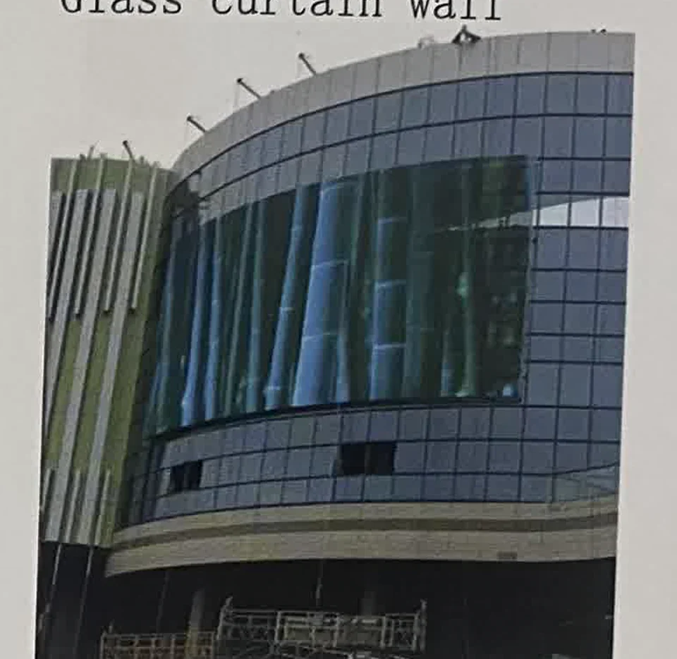 Large transparent LED display used as commercial media across a glass façade