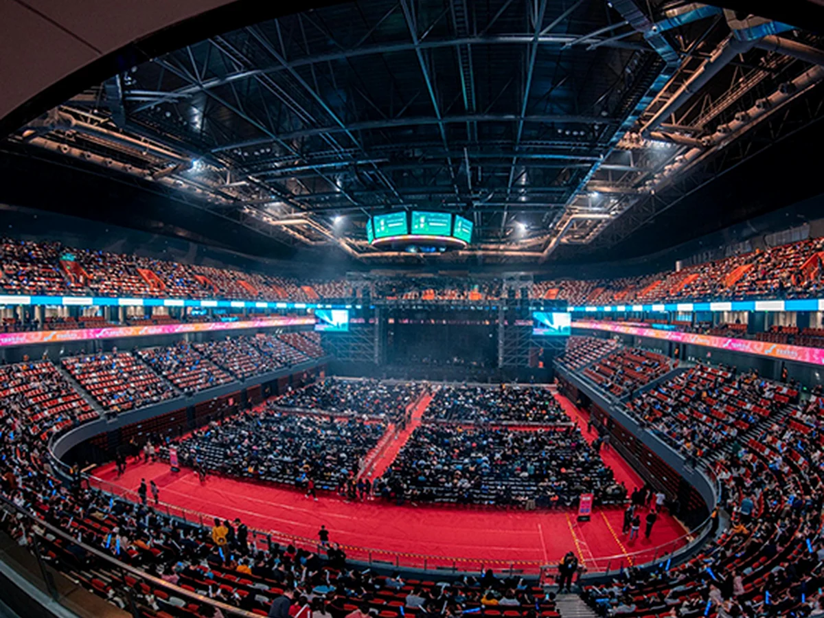 Continuous LED ribbon display around the seating bowl of an indoor sports arena