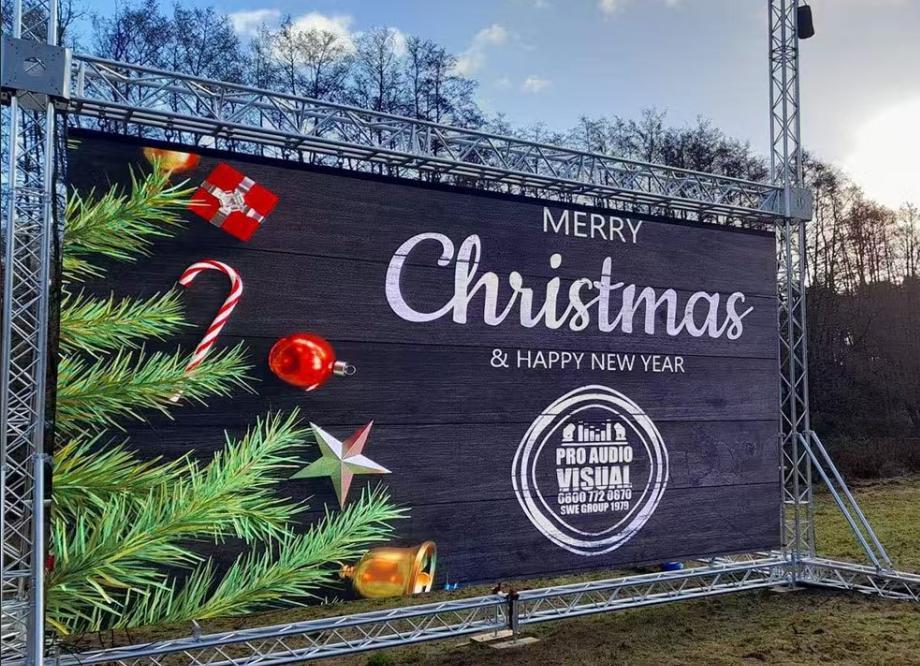 Outdoor LED display installed on a truss for a public event